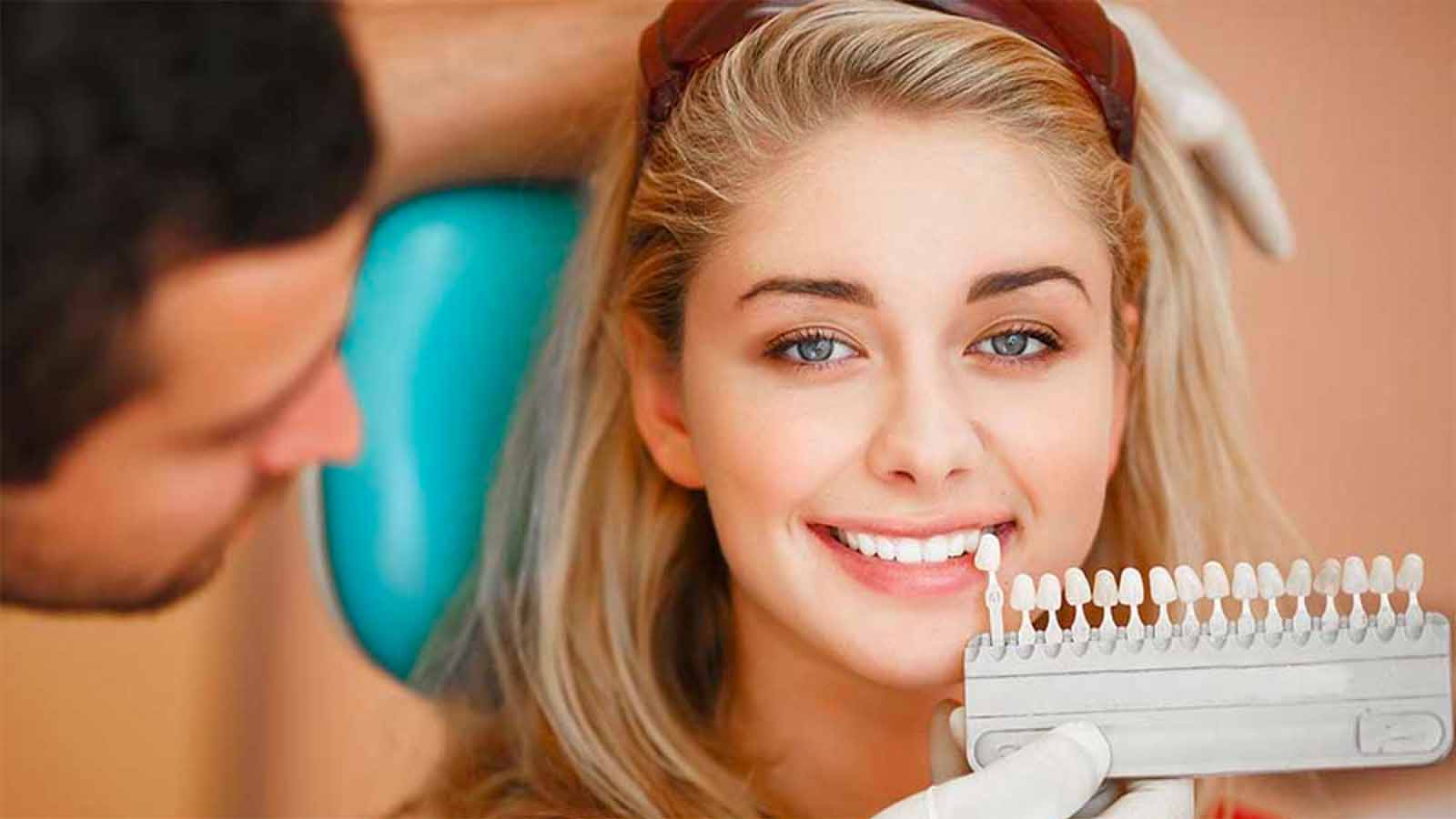 woman comparing veneers for perfect smile  Smile Makeover: Dental Treatment