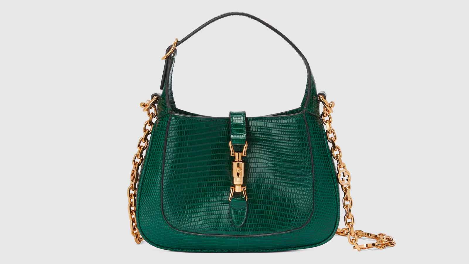   Designer Handbag: Gucci, Prada, or Chanel Bag + £10,000